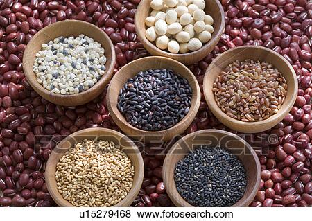 Wooden bowls of different grains, rice and beans on top of adzuki beans View Large Photo Image Stock Photo - Wooden bowls of different grains, rice and beans on top of adzuki beans. Fotosearch