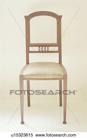 Stock Photography - Wooden chair against white background. Fotosearch