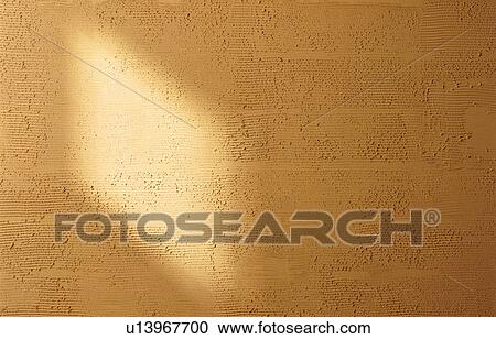 Stock Image - Yellow textured paint. Fotosearch
