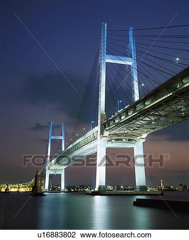 Stock Image - Yokohama Bay Bridge at sunset, Yokohama, Kanagawa Prefecture, Japan. Fotosearch