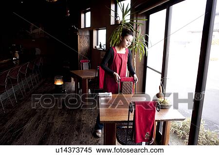 Young Woman Setting Chair View Large Photo Image Stock Photography - Young Woman Setting Chair. Fotosearch