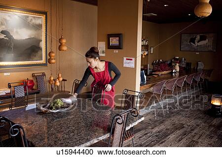Young Woman Wiping Table View Large Photo Image Stock Image - Young Woman Wiping Table. Fotosearch
