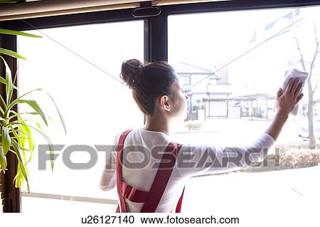 Young Woman Wiping Window View Large Photo Image Stock Image - Young Woman Wiping Window. Fotosearch