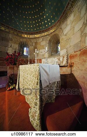 Stock Photo - Covered table at the altar of a church. Fotosearch