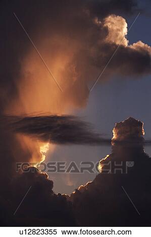 Stock Photography - Sunbeams through clouds. Fotosearch