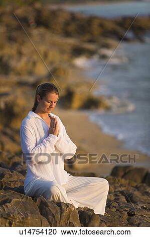 Woman praying View Large Photo Image Stock Image - Woman praying. Fotosearch