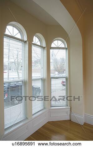 Stock Image - Bay window in empty apartment. Fotosearch