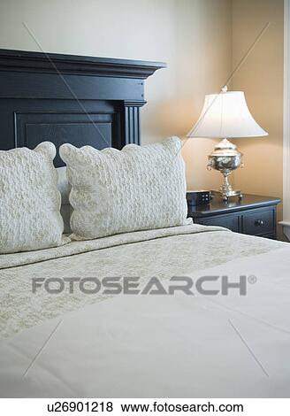 Bedspread and pillows on bed View Large Photo Image Stock Photo - Bedspread and pillows on bed. Fotosearch