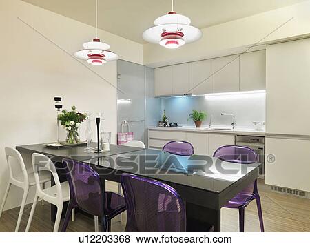 Black dining table with purple and white chairs View Large Photo Image Stock Photo - Black dining table with purple and white chairs. Fotosearch