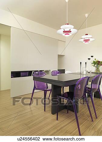 Black dining table with purple chairs View Large Photo Image Stock Image - Black dining table with purple chairs. Fotosearch