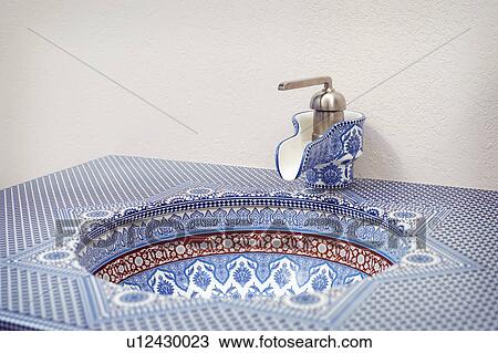 Blue and red geometric patterned bathroom sink View Large Photo Image Stock Image - Blue and red geometric patterned bathroom sink. Fotosearch