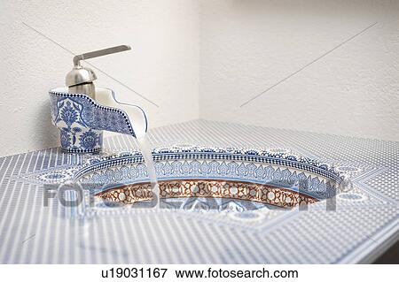Blue and red geometric patterned bathroom sink View Large Photo Image Stock Photo - Blue and red geometric patterned bathroom sink. Fotosearch