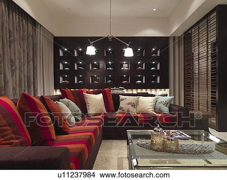 Bold striped sectional sofa in living room View Large Photo Image Picture - Bold striped sectional sofa in living room. Fotosearch