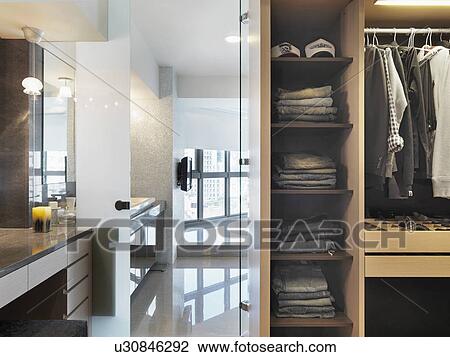 Stock Image - Closet and vanity in modern home. Fotosearch