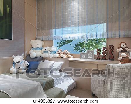 Collection of stuffed animals in modern bedroom View Large Photo Image Stock Photo - Collection of stuffed animals in modern bedroom. Fotosearch