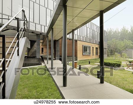 Stock Photography - Covered walkway outside modern building. Fotosearch