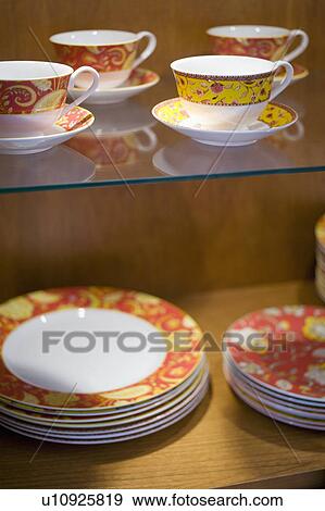 Decorative dishware in china cabinet View Large Photo Image Stock Photo - Decorative dishware in china cabinet. Fotosearch