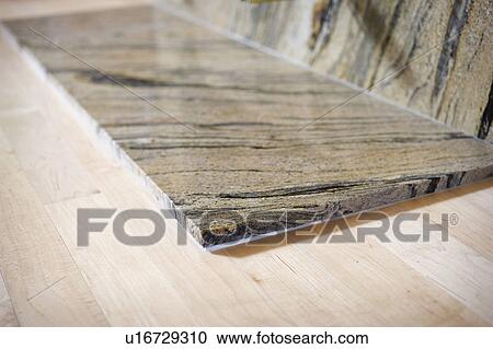 Detail base of marble fireplace against hardwood floor View Large Photo Image Stock Image - Detail base of marble fireplace against hardwood floor. Fotosearch