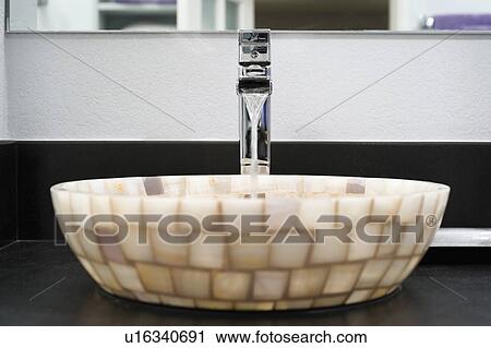 Stock Image - Detail mosaic tile sink. Fotosearch