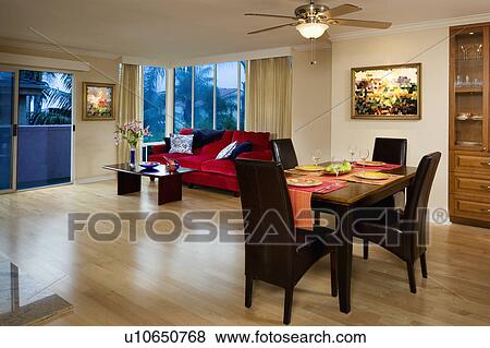 Stock Photo - Dining and living room in apartment style home. Fotosearch