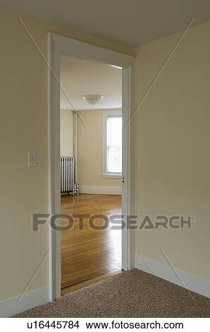 Picture - Doorway between rooms in empty apartment. Fotosearch