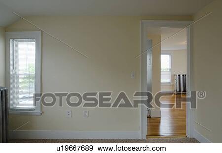 Doorway between rooms in empty apartment View Large Photo Image Stock Photo - Doorway between rooms in empty apartment. Fotosearch
