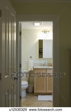 Stock Photo - Doorway to small traditional bathroom. Fotosearch
