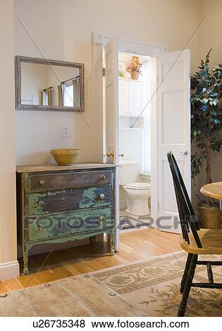 Stock Photo - Dresser near bathroom in apartment. Fotosearch