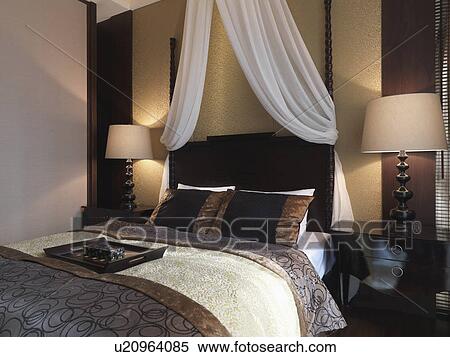 Stock Photography - Elegant black and brown bedroom. Fotosearch