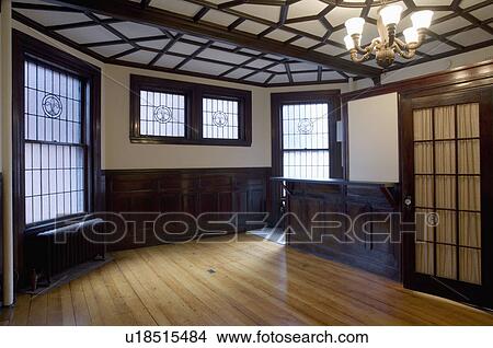 Picture - Empty room in apartment with hardwood floor. Fotosearch