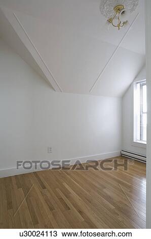 Empty room in apartment with hardwood floor View Large Photo Image Stock Image - Empty room in apartment with hardwood floor. Fotosearch