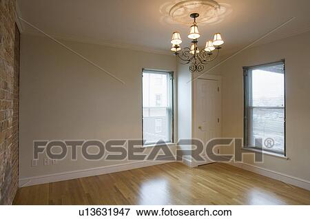 Stock Photo - Empty room in apartment with hardwood floor. Fotosearch