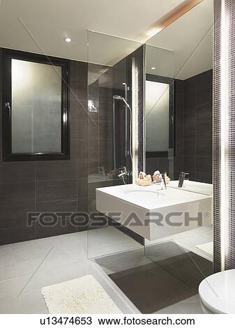 Floating sink in modern bathroom View Large Photo Image Stock Image - Floating sink in modern bathroom. Fotosearch