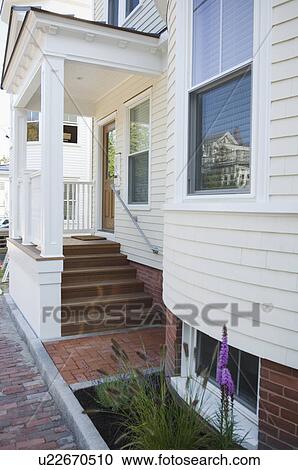 Front entrance to traditional home View Large Photo Image Stock Image - Front entrance to traditional home. Fotosearch