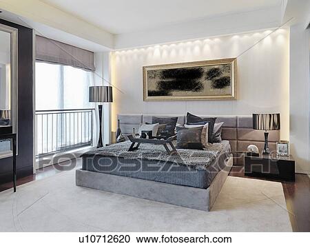 Stock Image - Gray modern bedroom. Fotosearch