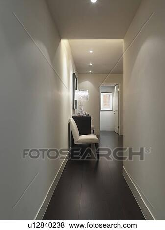 Hallway in home with hardwood floor View Large Photo Image Stock Photo - Hallway in home with hardwood floor. Fotosearch
