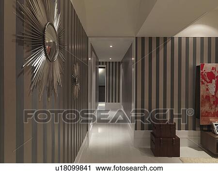 Hallway in home with striped wall paper View Large Photo Image Stock Image - Hallway in home with striped wall paper. Fotosearch