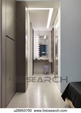 Hallway to vanity in modern home View Large Photo Image Stock Image - Hallway to vanity in modern home. Fotosearch