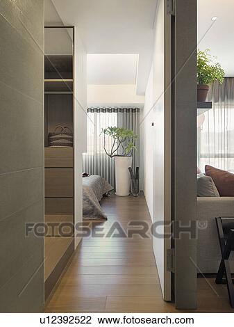 Hardwood floor in hallway of modern home View Large Photo Image Stock Image - Hardwood floor in hallway of modern home. Fotosearch