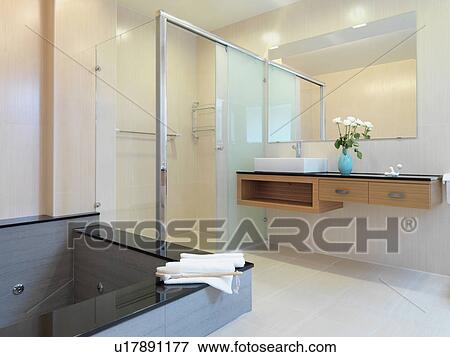 Jacuzzi tub in modern bathroom View Large Photo Image Stock Photo - Jacuzzi tub in modern bathroom. Fotosearch