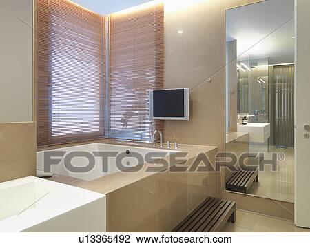 Large bathtub in modern bathroom View Large Photo Image Stock Image - Large bathtub in modern bathroom. Fotosearch