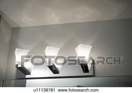 Stock Image - Light above mirror. Fotosearch