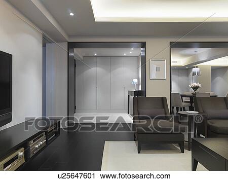 Living room and hallway in modern home View Large Photo Image Stock Image - Living room and hallway in modern home. Fotosearch