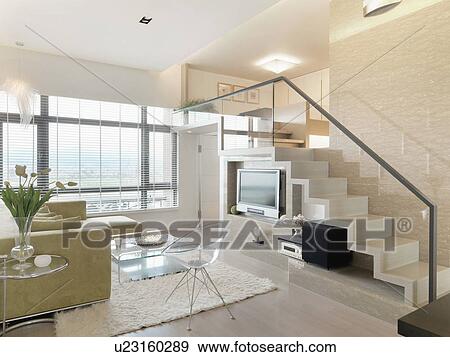 Living room and staircase in modern home View Large Photo Image Stock Photo - Living room and staircase in modern home. Fotosearch