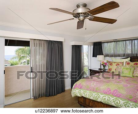 Master bedroom with pink and green accents View Large Photo Image Stock Photo - Master bedroom with pink and green accents. Fotosearch
