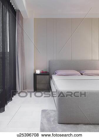 Stock Photo - Minimalism bedroom. Fotosearch