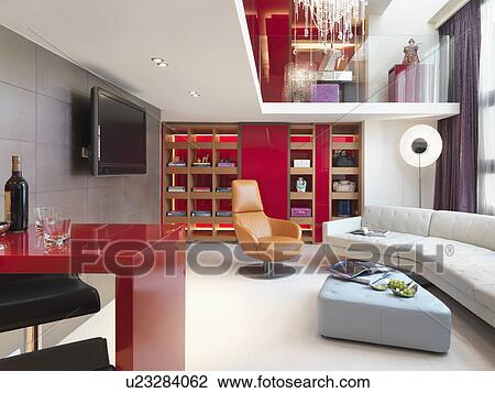 Stock Image - Modern apartment home with red wall. Fotosearch