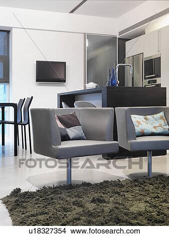 Picture - Modern bucket chairs in living room. Fotosearch