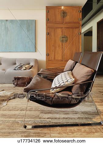 Stock Photograph - Modern chairs in living room. Fotosearch