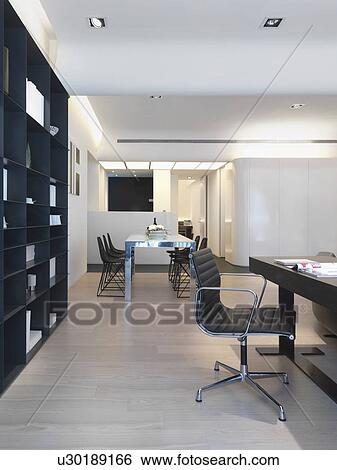 Modern interior with dining table and desk View Large Photo Image Stock Photograph - Modern interior with dining table and desk. Fotosearch